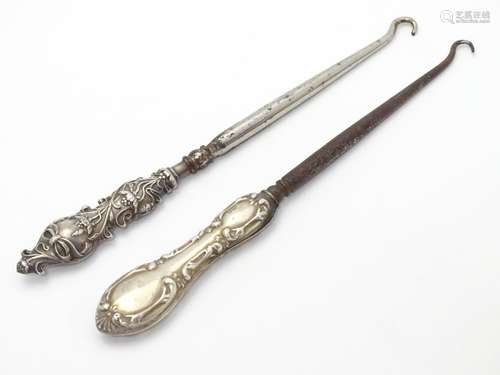 Two silver-handled lace / button hooks. Hallmarked Birmingham 1906 maker Adie & Lovekin Ltd and