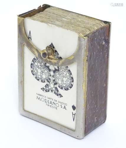 A miniature deck of playing cards contained within a silver plate and leather case. Approx 1 3/4