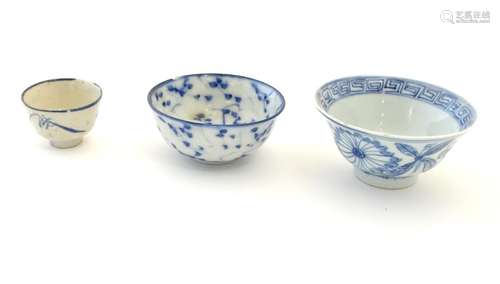 Three assorted Oriental blue and white wares to include saki cup, tea bowls etc. Character marks