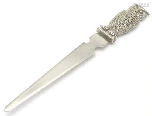 A silver plate letter opener / paper knife. The handle formed as an owl. 7