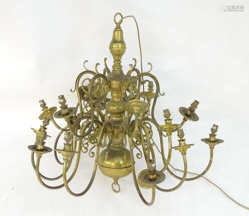 A mid to late 20thC two-tier pendant electrolier, with eighteen lights over two tiers, 36