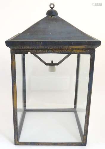 An early 20thC large hanging light of lantern form with four glass panels. The whole Approx 32