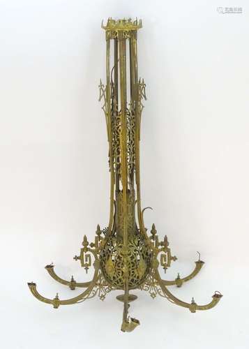 An early-20thC large gilt brass pendant/hanging hall electrolier, the six curved arms joined to a