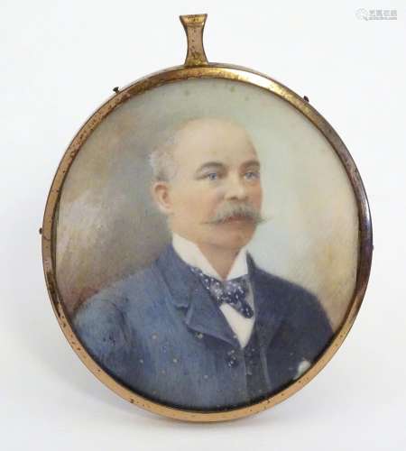 A late 19th / early 20thC oval watercolour and bodycolour portrait miniature depicting a gentleman