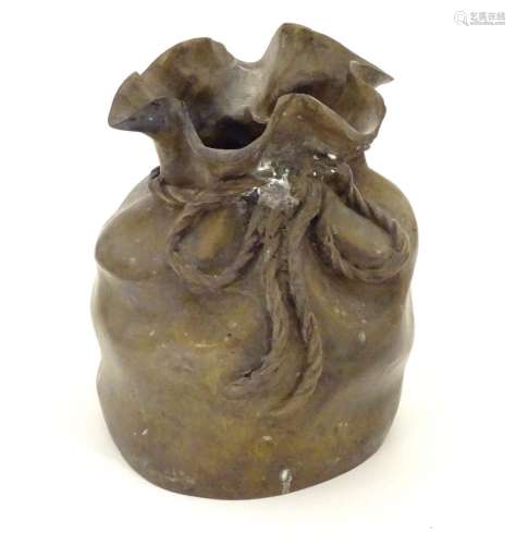 A late 19thC cast bronze modelled as a sack with a rope tie. Marked under. Approx. 6 3/4