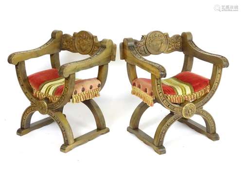 A pair of vintage Savonarola chairs with carved and moulded X-frames. 23