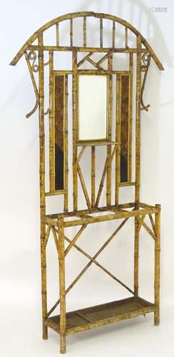 A late 19thC Meiji period hallstand of bamboo construction, having coat and hat hooks, a central