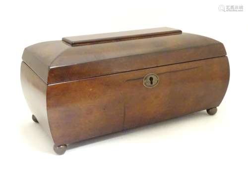 A late 20thC hardwood box of sarcophagus form with a fitted lift out tray within. Approx. 13