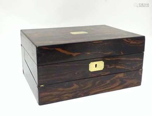 A Victorian coromandel veneered writing box / slope with correspondence pocket and fitted