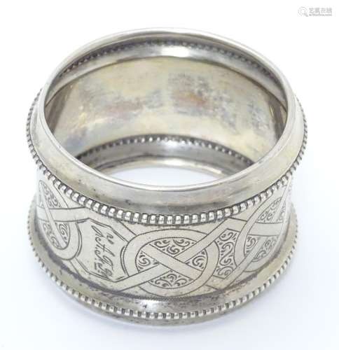 A ate 19thC continental silver large napkin ring with engraved decoration. Possibly Dutch. Approx