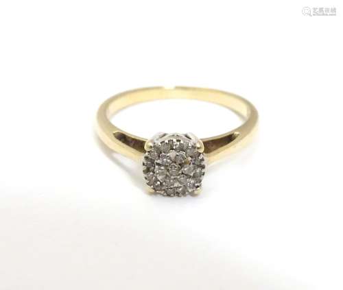 A 9ct gold ring set with a profusion of diamonds. Ring size approx. I Please Note - we do not make