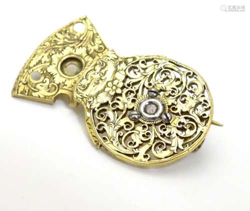 A gilt metal brooch formed from a verge pocket watch balance cock, set with diamond to centre.