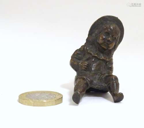 A late 19thC bronze modelled as a young girl with a hat. Approx. 2