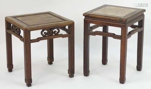 Two oriental hardwood tables / jardiniere stands with pierced decoration and shaped supports. 16