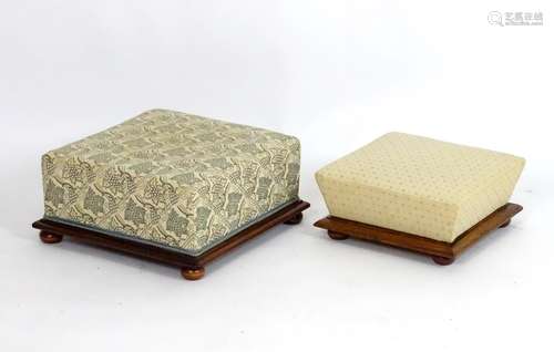 Two late 19thC overstuffed footstools with moulded mahogany frames and raised on squat bun feet. 17