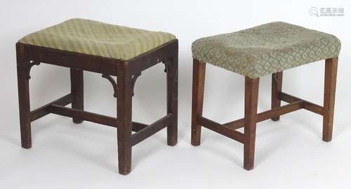 Two mahogany 18thC stools with shaped tapering legs and united by H stretchers. The largest