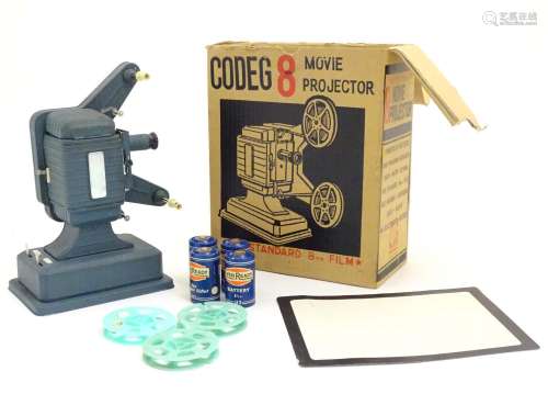 A 1960s Codeg 8 Japanese toy movie projector, with original box, approximately 10