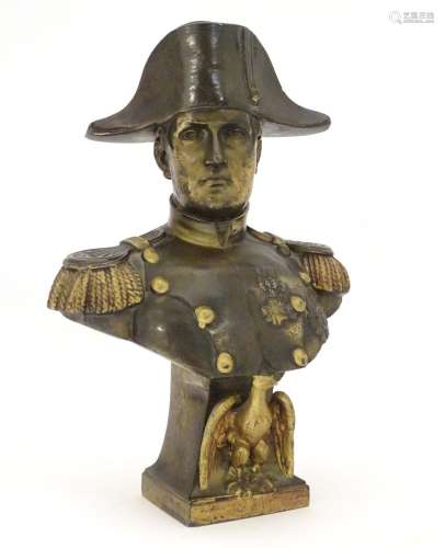 A 20thC cast bust of emperor Napoleon Bonaparte wearing uniform and a bicorne hat, with gilt