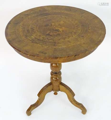 A 19thC Sorrento table with a profusely inlaid marquetry top and having a turned pedestal base