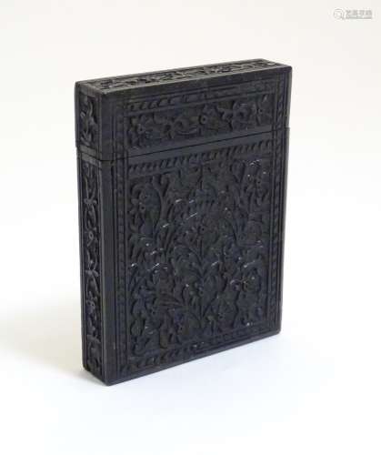 A Victorian ebonised card case with floral and foliate carved detail. Approx. 4 1/4