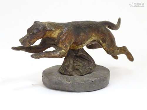 A late 19th / early 20thC cold painted bronze car mascot modelled as a running hound / dog, on an
