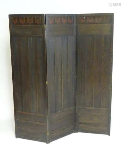 An early 20thC Art Deco oak folding screen with butterfly decoration. 68