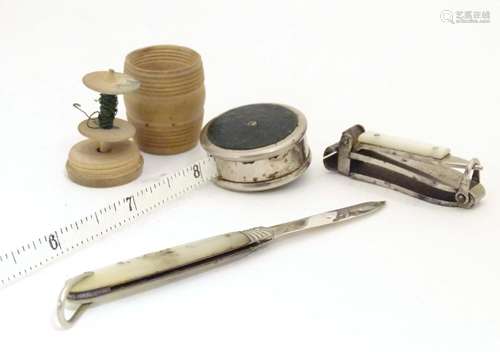 Four assorted Victorian and later items to include a treen thread box of barrel form, a silver