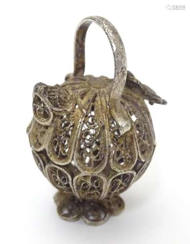 A white metal pendant / model formed as a filigree jar / vessel. Approx 1 /2