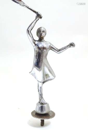 A 20thC chrome car mascot modelled as a female tennis player. Approx. 7 3/4