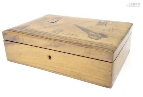 A late 19th / early 20thC olivewood sewing box the hinged lid inlaid with sewing implement