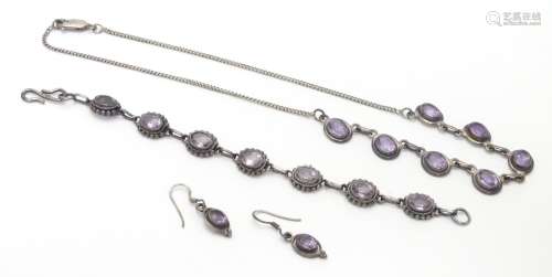 A silver and amethyst suite of jewellery comprising necklace bracket and earrings Please Note - we