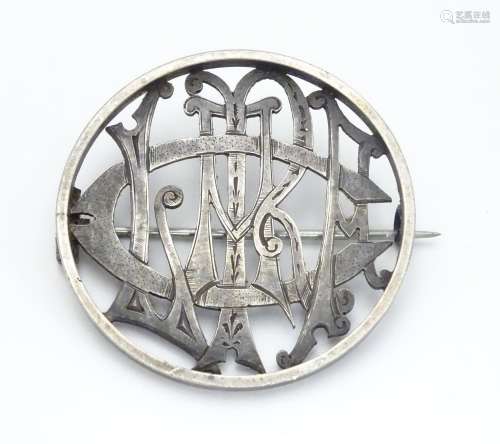 A Victorian brooch of circular form within monogram cipher ' Clare' to centre. 1 1/2