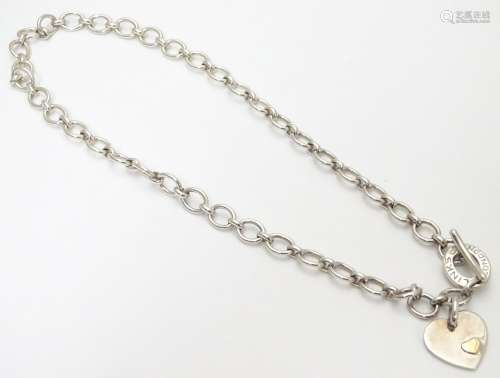 A silver chain necklace by Links of London, with engraved / inscribed heart pendant. Approx 16