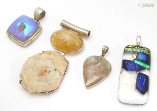 Four various silver and white metal mounted pendants, including an Art Glass example 2 1/2