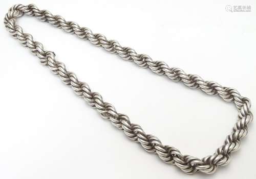 A large silver rope twist necklace. The ropetwist approx 1/2