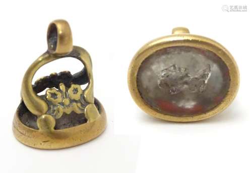 A gilt metal pendant fob seal with seal under depicting a male head. 1