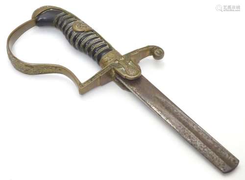 Militaria: a Wehrmacht Heer (1935-1945) sword hilt and partial blade by Puma, Solingen. The brass