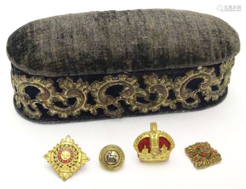 Militaria: a white metal mounted oval sewing container/pin cushion, containing a British Army