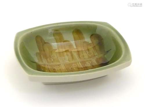 A Ditmar Urbach slipware bowl with hand painted green and brown abstract detail. Marked under and