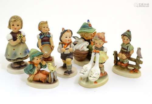 A collection of seven vintage Hummel figurines, comprising #47 Goose Girl, #58/0 Playmates, #63