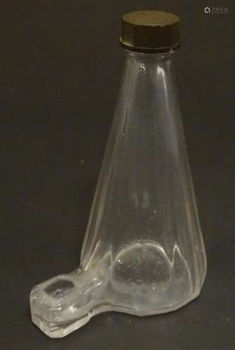 A glass bird feeder of conical form with Bakelite screw top. 5