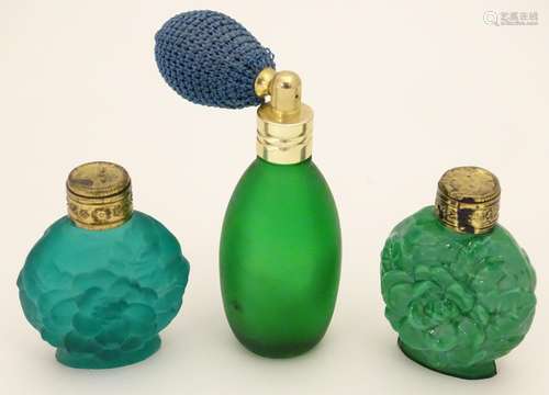 A green glass scent / perfume bottle with atomiser top together with two scent / snuff bottle with