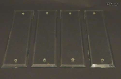 A set of four early 20thC glass door finger plates, with bevelled edges, each 11