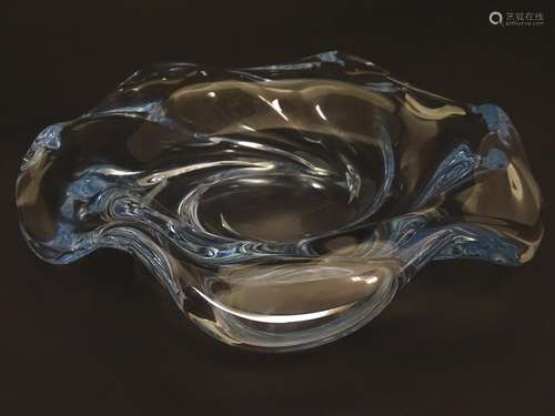 An c1940 Orrefors Edvin Ohrstrom centerpiece glass crystal bowl, formed as a swirl, signed under '