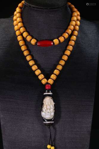 A Sherpa Glass Bead Necklace With Nine-Eye Dzi