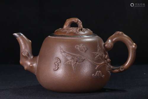 A Zisha Teapot Of Bat Pattern