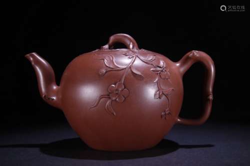 A Zisha Teapot Of Plum Flower Pattern