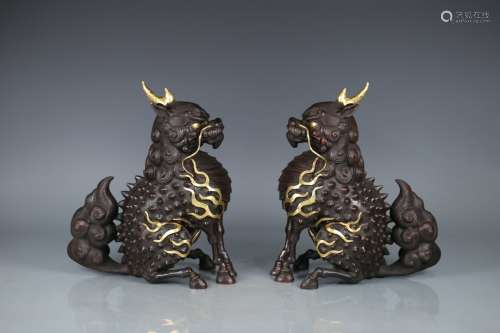Pair Of Bronze Beast Ornaments With Partly Gilding