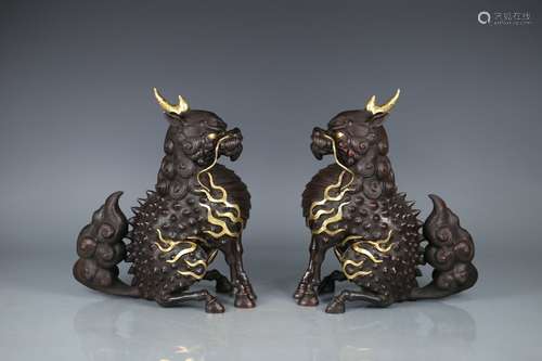 Pair Of Bronze Beast Ornaments With Partly Gilding