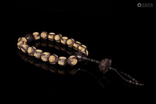 An Agarwood Bracelet Embed Gilding